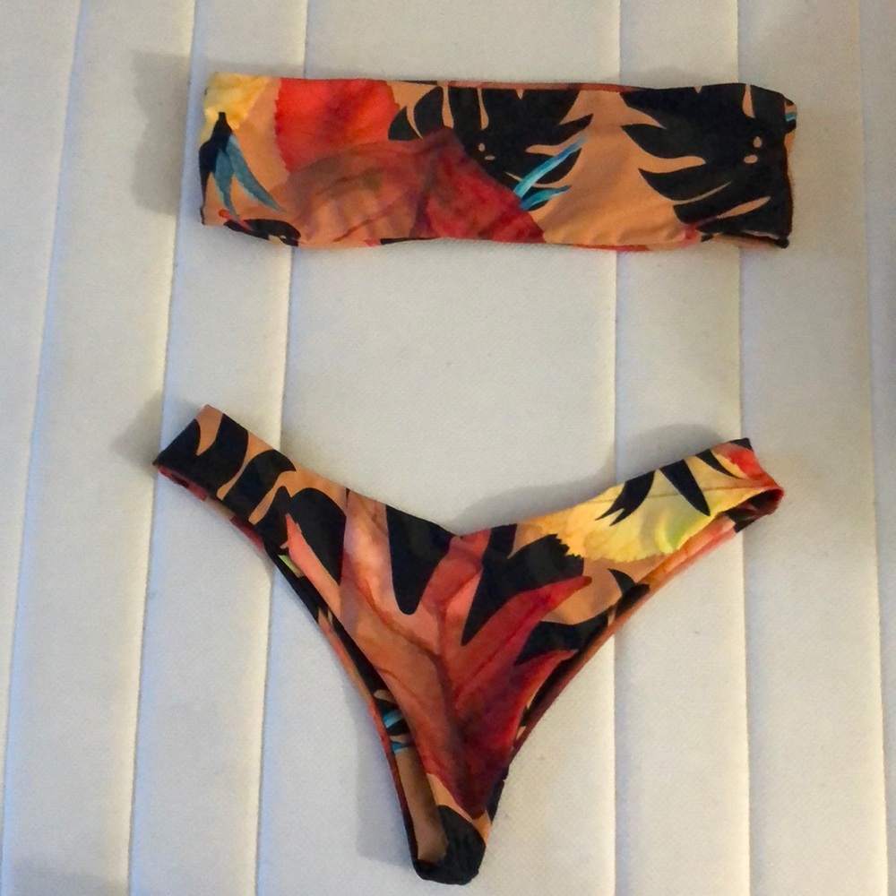 Two piece swim suit, never been worn